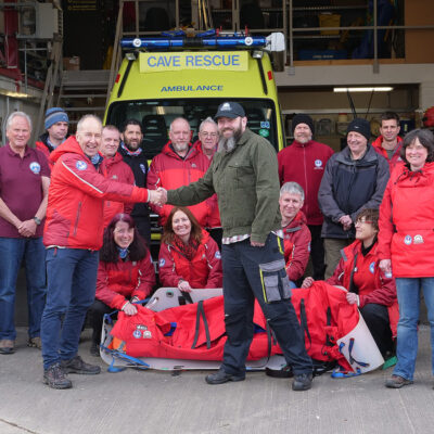 BCRC Chairman, Peter Dennis, thanking Phil Catling, Subterranea Britannica for generous support in the production of casualty bags and rescue jackets.